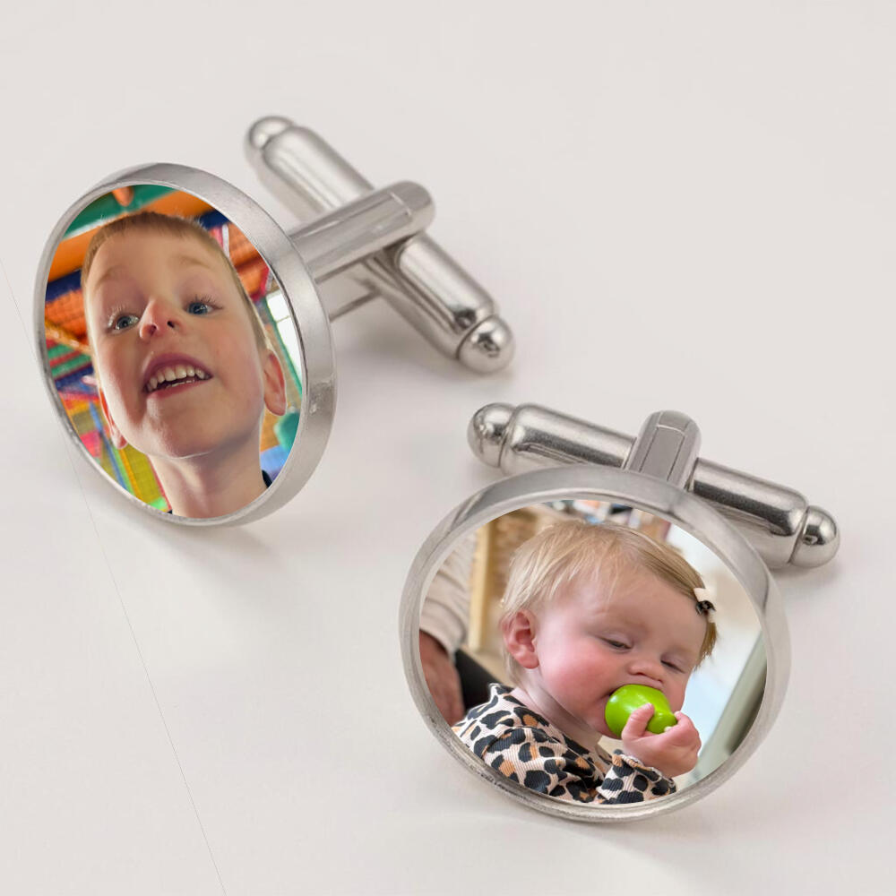 A pair of polished silver circular cufflinks displaying custom printed color photos of a young boy and a toddler baby girl by QuestAbstract
